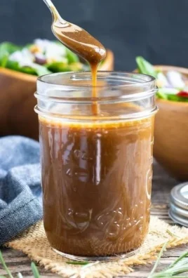 Homemade Balsamic Vinaigrette drizzled over fresh salad.