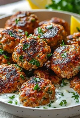 Delicious Chicken Kofta served with garlic yogurt sauce on a plate
