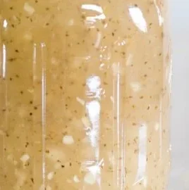 Creamy celery seed dressing served in a bowl