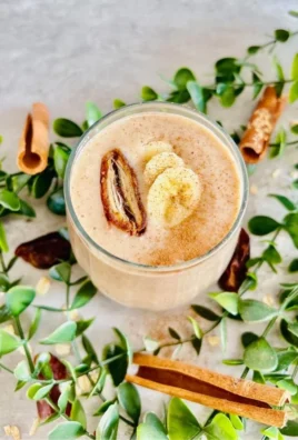 Healthy dates smoothie for weight loss in a glass with fresh ingredients