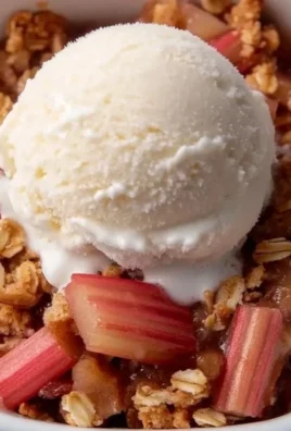 Delicious gluten free rhubarb crisp served in a dish with a golden topping