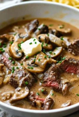 Gordon Ramsay's delicious beef stroganoff served in a rustic bowl