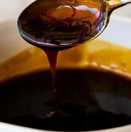 Bowl of homemade teriyaki sauce made from scratch with fresh ingredients.