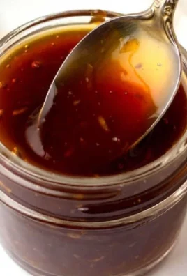 A bowl of homemade teriyaki sauce with fresh ingredients