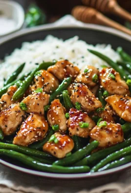 Delicious Honey Garlic Chicken with Green Beans placed on a plate