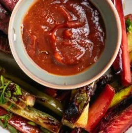 Homemade rhubarb steak sauce served with grilled steak.