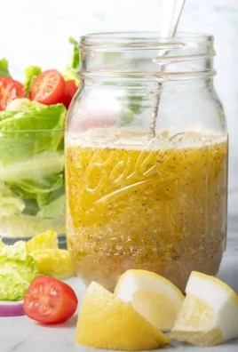 Delicious Mediterranean salad dressing drizzled over fresh greens