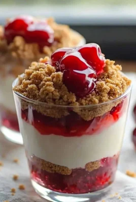 No-bake cheesecake parfait with layers of cream and fruit