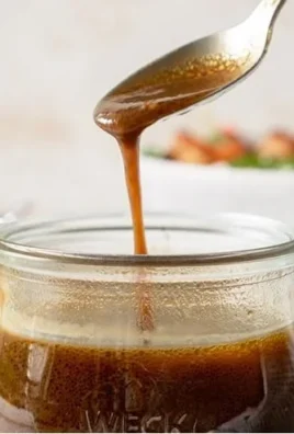 Simple honey balsamic dressing drizzled over a fresh salad.