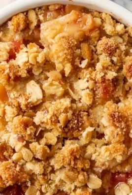 Delicious simple rhubarb crisp served in a bowl, perfect dessert for two.