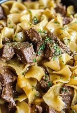 Slow Cooker Beef and Noodles dish made with tender beef and rich sauce