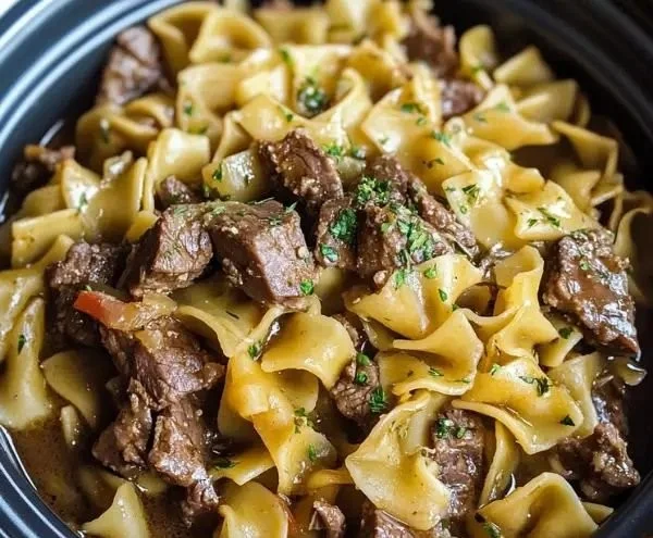 Slow Cooker Beef and Noodles dish made with tender beef and rich sauce