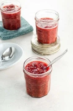Delicious homemade strawberry rhubarb sauce in a glass jar