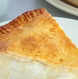 Delicious Buko Pie, a traditional Filipino coconut pie, sliced and ready to serve.