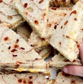 Creamy orange cinnamon tea sandwiches served on a platter