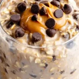 Dreamy peanut butter chocolate chip overnight oats in a glass jar