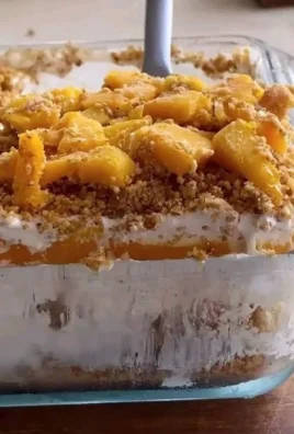 Delicious Filipino Mango Float dessert with layers of mango and cream.