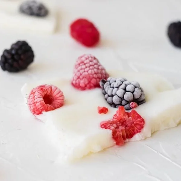 Delicious frozen yogurt bark topped with fresh fruits and nuts