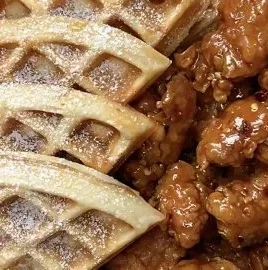 Delicious hot honey chicken served atop fluffy waffles