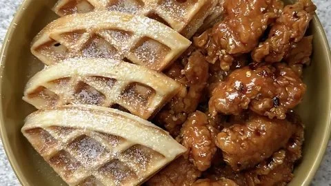 Delicious hot honey chicken served atop fluffy waffles
