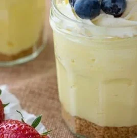 Delicious lemon cheesecake mousse parfaits served in elegant glasses.