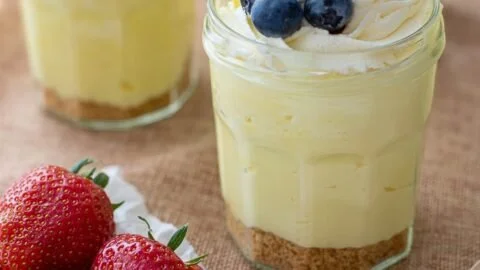 Delicious lemon cheesecake mousse parfaits served in elegant glasses.