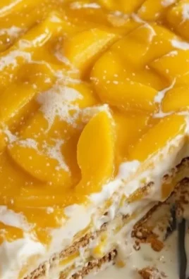 Delicious Mango Float dessert with layers of mango and cream