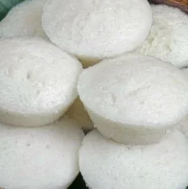 Delicious steamed rice cake showcased on a plate, perfect for any occasion.