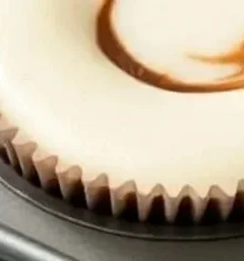 Tiramisu Cheesecake Cups with coffee and cocoa layers in elegant presentation