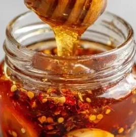 Ultimate garlic hot honey recipe for sweet and spicy flavor.