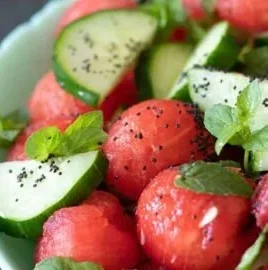 Vegan minty watermelon cucumber salad without feta, vibrant and refreshing dish.
