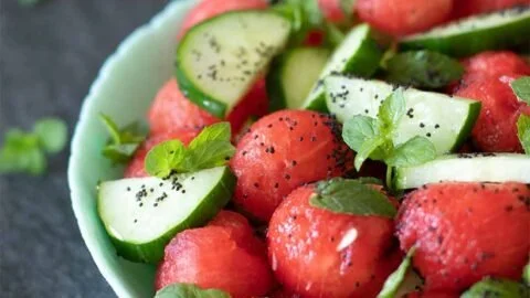 Vegan minty watermelon cucumber salad without feta, vibrant and refreshing dish.