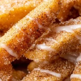 Crispy air fryer apple fries served with a cinnamon dipping sauce