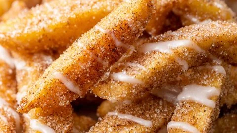 Crispy air fryer apple fries served with a cinnamon dipping sauce
