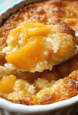 Delicious easy canned peach cobbler topped with golden biscuit crust
