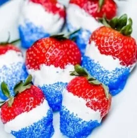 Easy dessert strawberries layered with red, white, and blue for festive occasions