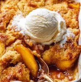 Easy peach cobbler dessert with fresh peaches and buttery crust