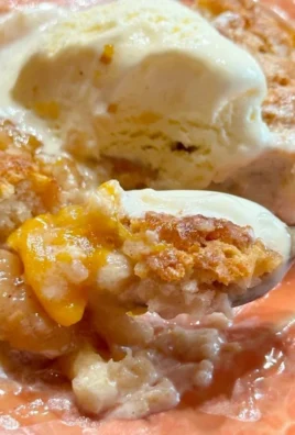 Homemade Peach Cobbler with juicy peaches and golden crust