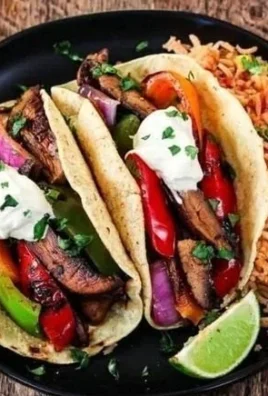 Portobello vegan fajitas served with colorful peppers and onions