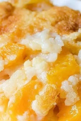 Delicious super easy peach cobbler served in a rustic dish