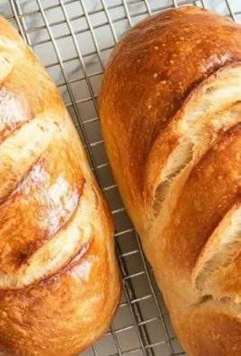 Loaf of freshly baked Amish sweet bread with a golden crust and soft texture.