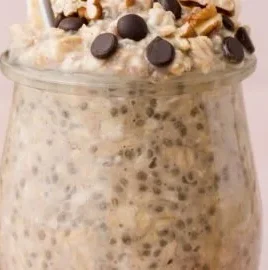 Delicious banana bread overnight oats topped with banana slices and nuts
