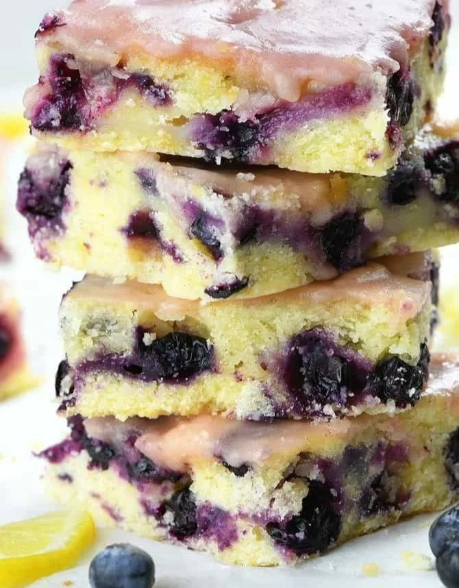 Freshly baked Blueberry Lemon Blondies with blueberries and lemon zest