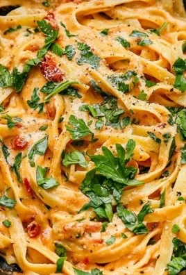 Creamy vegan sun-dried tomato pasta served in a bowl