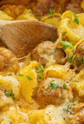 Crock Pot Meatballs and Tortellini dish served hot