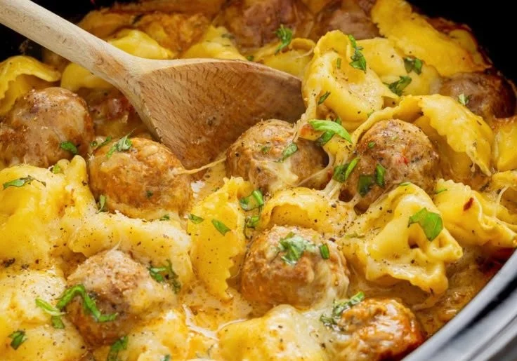 Crock Pot Meatballs and Tortellini dish served hot