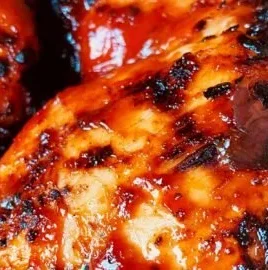 Korean BBQ grilled chicken served with side dishes for a delicious meal