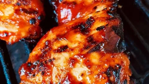 Korean BBQ grilled chicken served with side dishes for a delicious meal