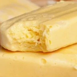 Refreshing homemade mango popsicles served on a sunny day
