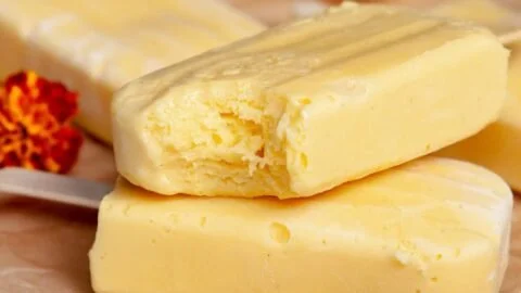 Refreshing homemade mango popsicles served on a sunny day
